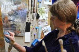 Kathy Blankley Roman at work in her studio