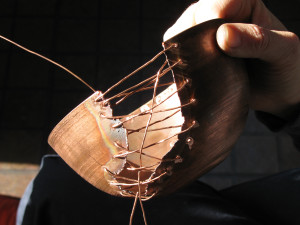 Sewing formed copper bowl with copper wire in copper enamel process, enameling