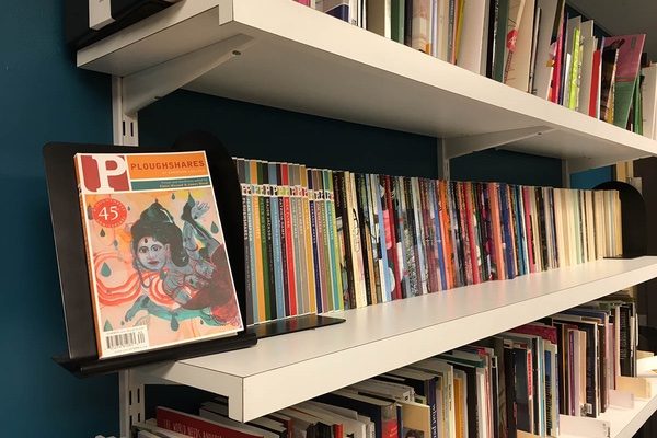 The 45th anniversary edition of Ploughshares, left, flanks shelves of the literary magazine at its Emerson College offices.