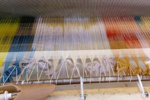 Weaving on the Floor Loom Photo/Julia Wright