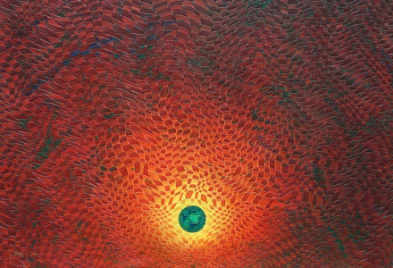 A woven painting of earth, with yellow, orange, and red rings around