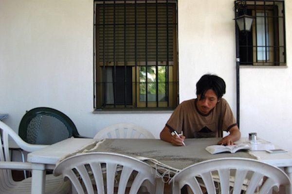 Yasuaki Okamoto working at his house