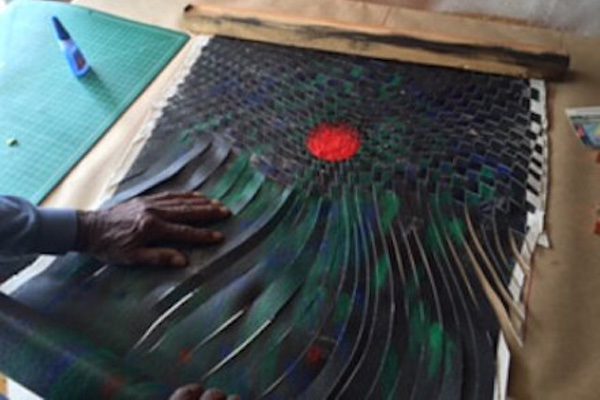 One of Mohan Sundaresan's woven paintings in process, two completed paintings being woven together