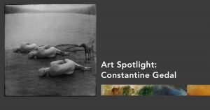 A black and white photograph of three naked women and a dog laying on the shore of a lake