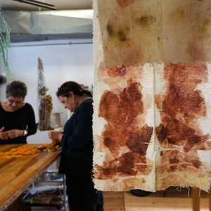 Hanging works of art in progress in an artist studio workshop