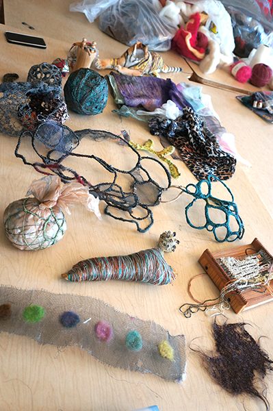 Pieces of fiber material on the table in a workshop