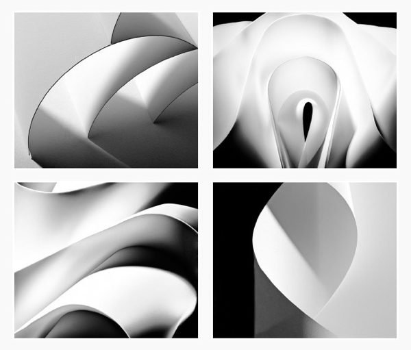 A series of black and white close up photographs of pieces of paper