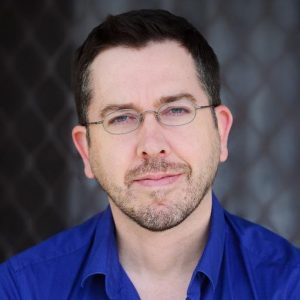 Headshot of writer Stuart Kells