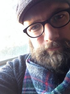 Headshot of writer Chris Brauer 