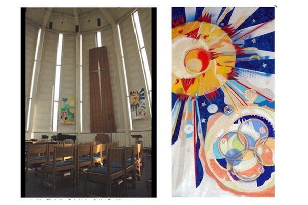 Colorful abstract paintings representing the six days of creation hang in a church