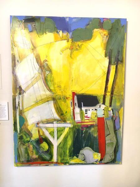 An abstract painting of a house and it's surrounding aread