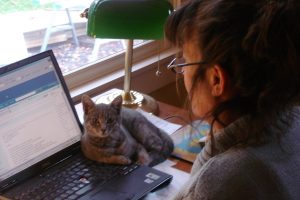 Writer Dian Parker, and her cat, portrait