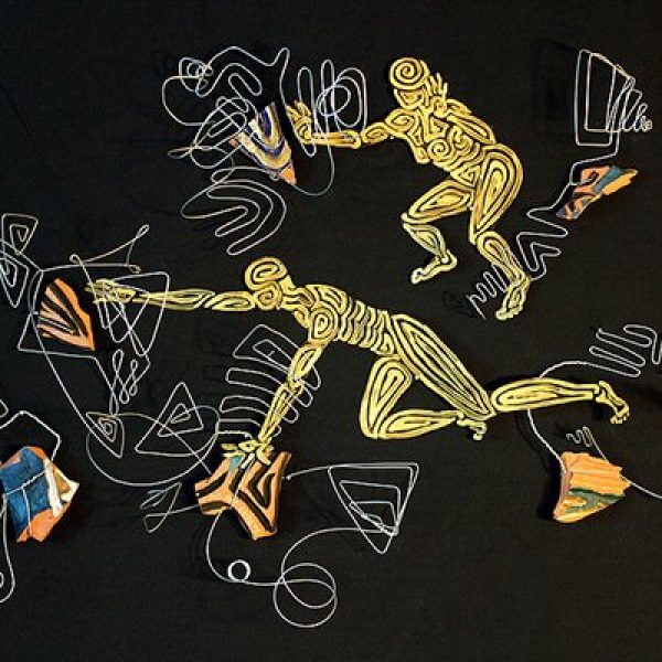 A mixed media work of abstract human figures and pieces of clay