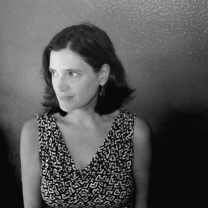 black and white headshot of writer Carolyn Guinzio