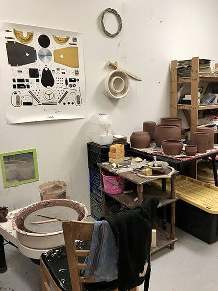 Chairs and pottery in Rangel-Cascio's studio