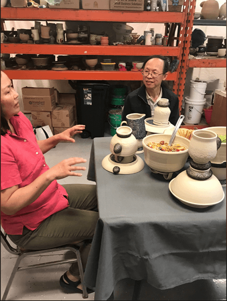 Cascio and friends eat dinner in her studio