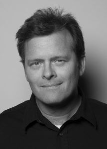 Black and white headshot of writer David Blair