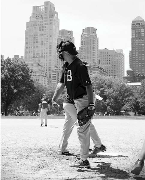 Black and white photograph of a man playing baseball