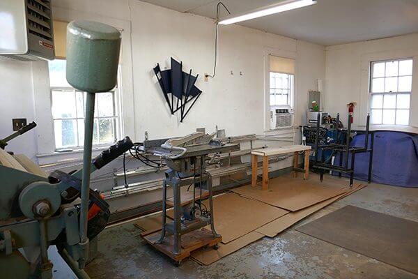 An art studio with work tools to create aluminum sculpture