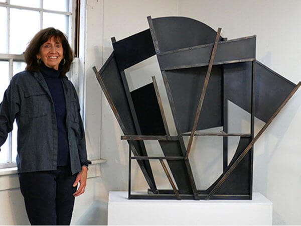 Margaret Swan and her sculpture