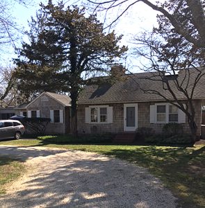 front of a house in the hamptons, new york