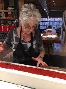 Catherine Eaton Skinner working in her renovated Seattle studio