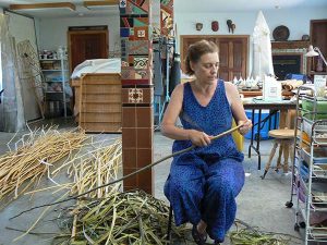 Jo Stealey working with twigs and branches in her studio