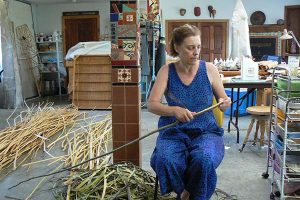 Jo Stealey working with twigs and branches in her studio