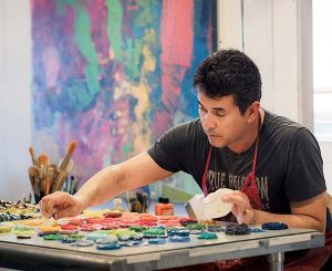 Image of abstract painter Henry Jackson in his studio