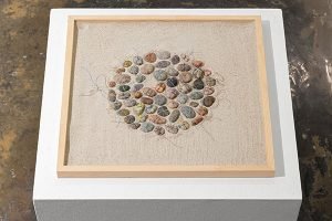 Anna Lisa Sorensen, Memorial Stones…Las Vegas, 2018. Stones, string, sand, 18” x 18” x 2”