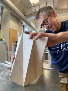 Joshua Enck and metal bars in his studio