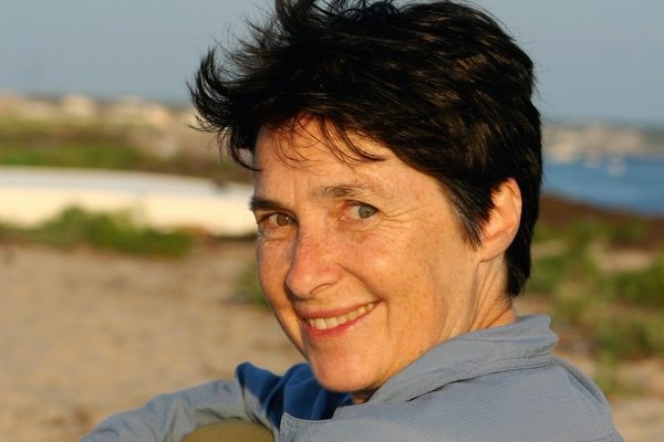 Poet Laura Foley on the beach