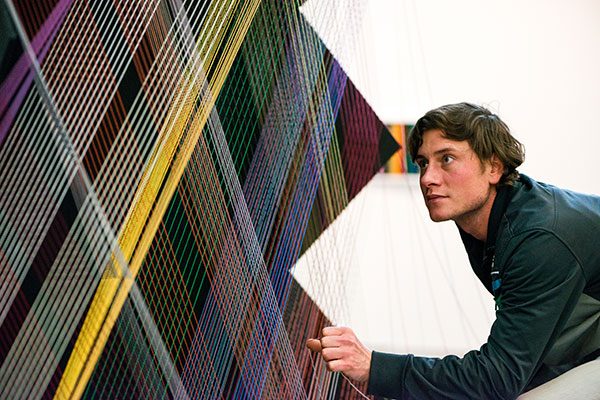 string artist Manual Knapp in his studio