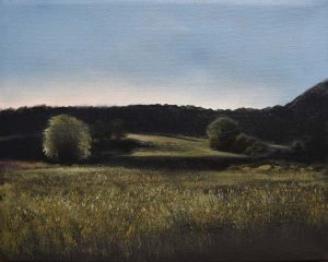 Landscape oil painting of a grassy field leading up to a hill