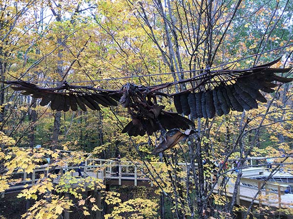 A sculpture of a flying eagle