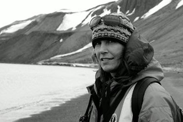 Photo of writer Elizabeth Bradfield at a glacier