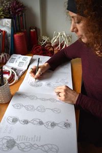 Tara Kennedy draws in her studio