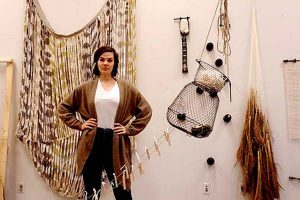 Sophia Ruppert with her fiber sculptures