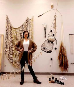 Sophia Ruppert with her fiber sculptures