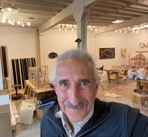 A selfie of artist Howard Hersh in his studio