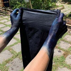 Dyeing with natural indigo dye.