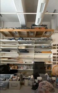 Adjustable storage racks hang in Etty Yaniv’s studio.